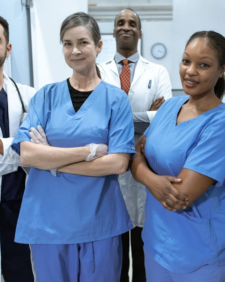 Smiling healthcare team in scrubs
